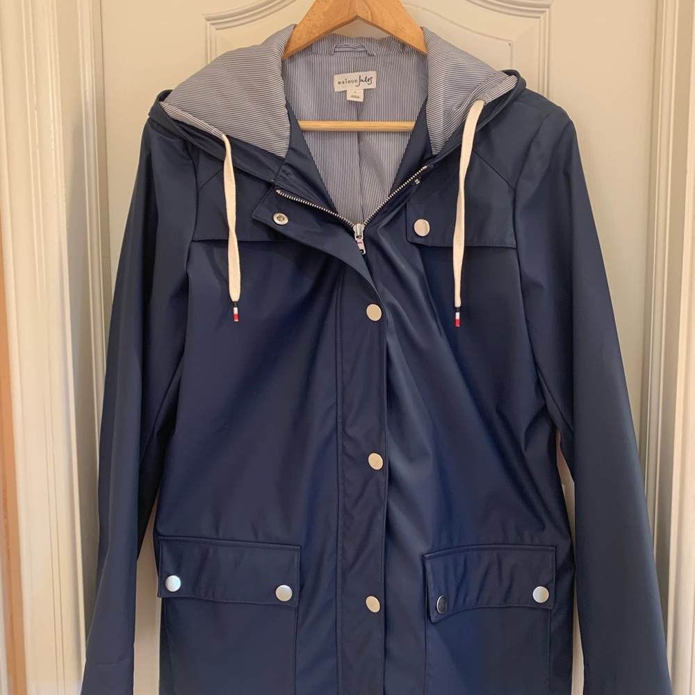 Navy Raincoat with hood. Size large.